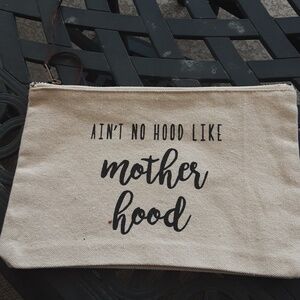 Canvas makeup bag 'Ain't no hood like Motherhood' saying on front